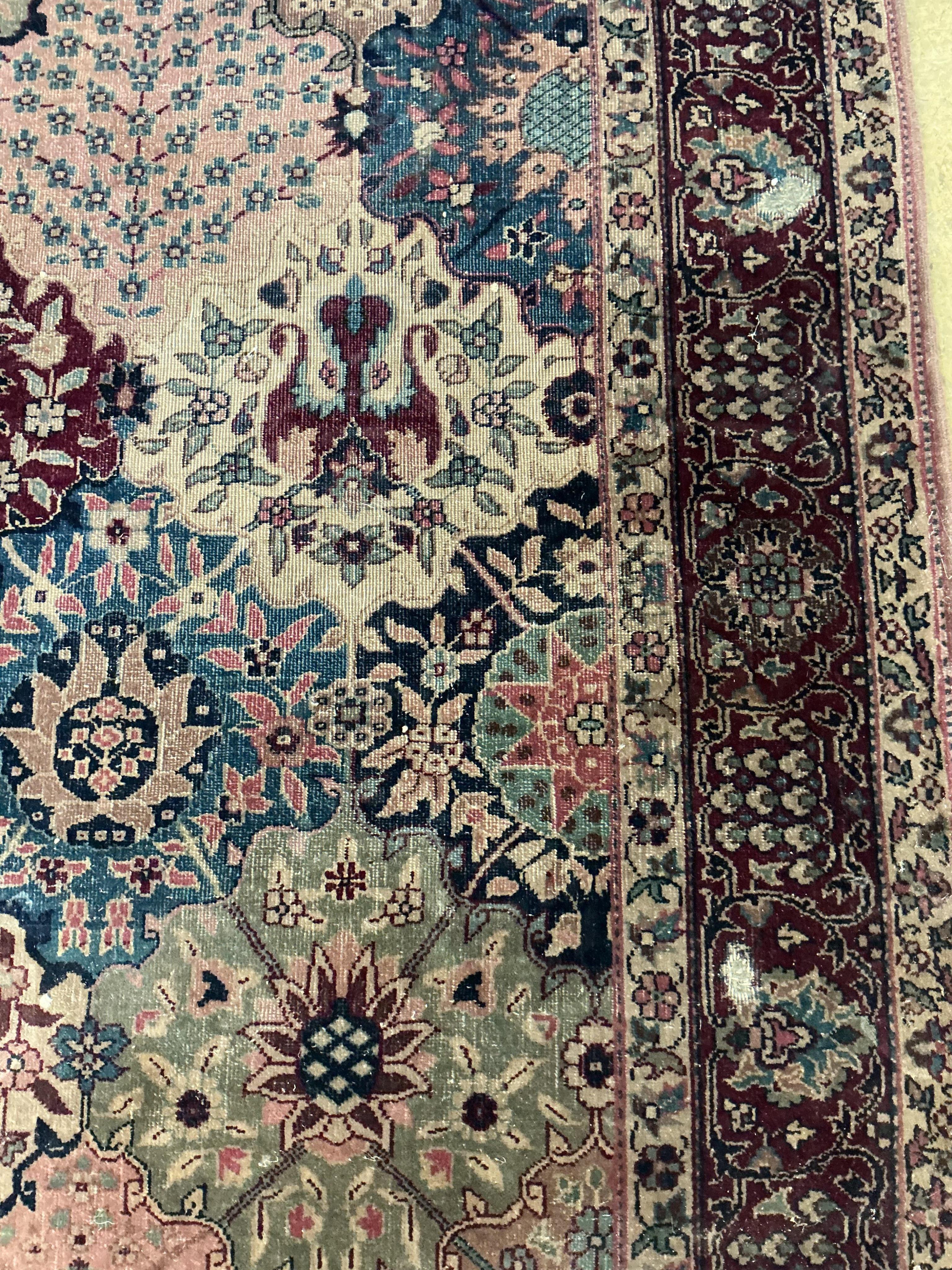 A North West Persian floral rug, 250 x 136cm